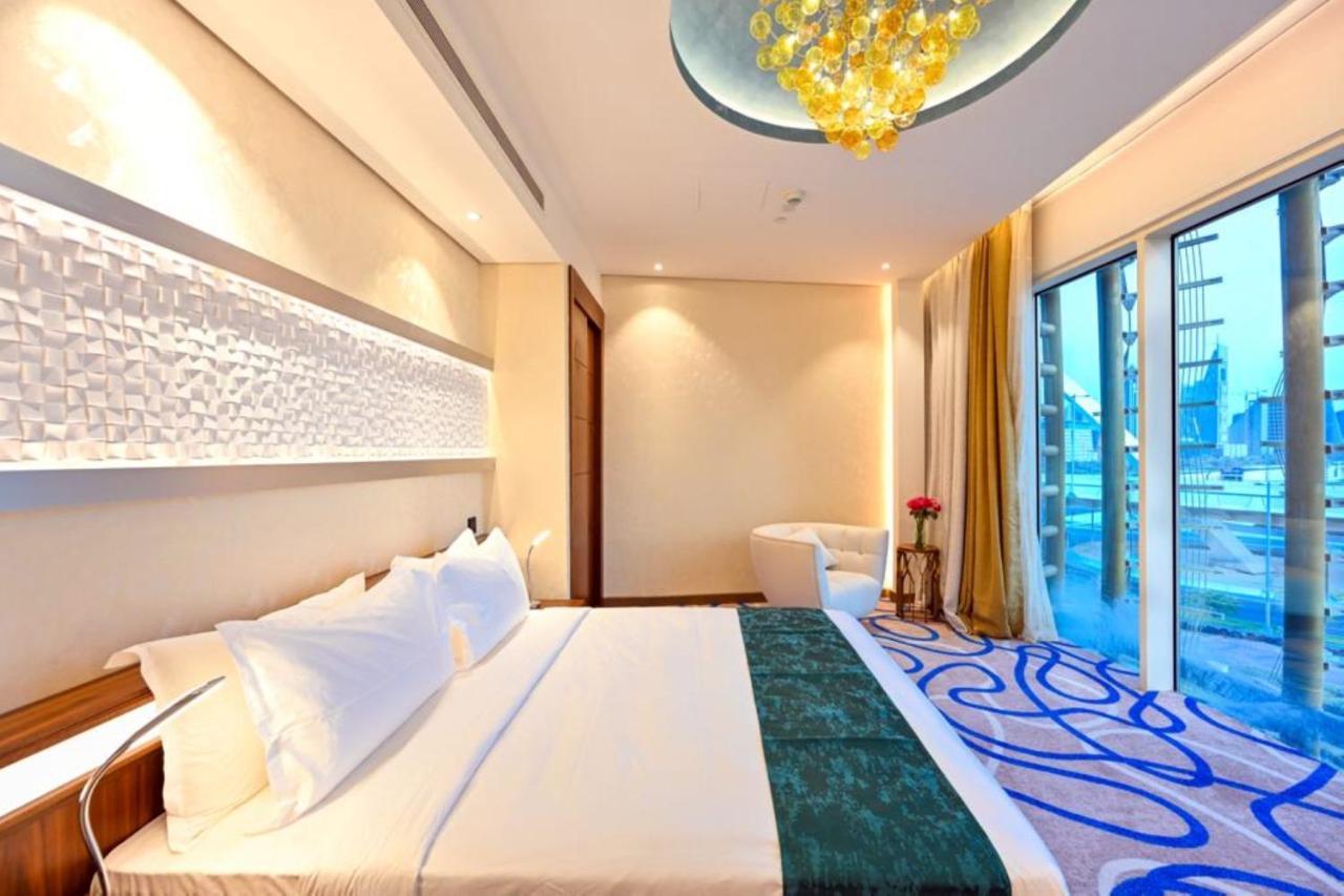 Cielo Hotel Lusail Qatar Exterior photo A bedroom at the hotel
