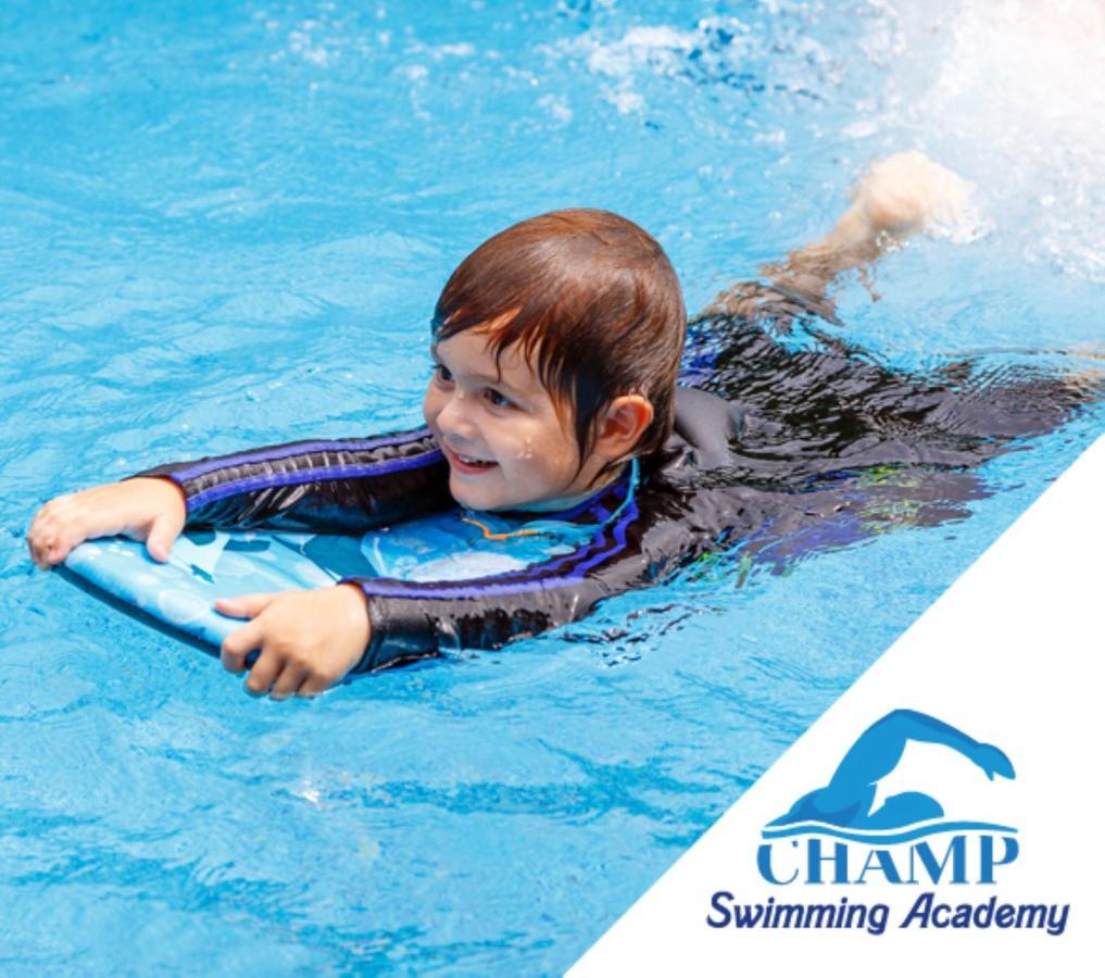 Cielo Hotel Lusail Qatar Exterior photo Child swimming with a float