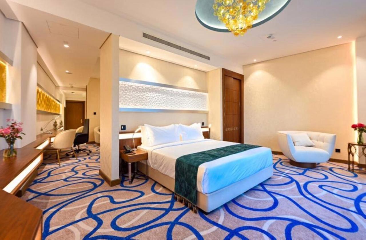 Cielo Hotel Lusail Qatar Exterior photo A bedroom at the hotel
