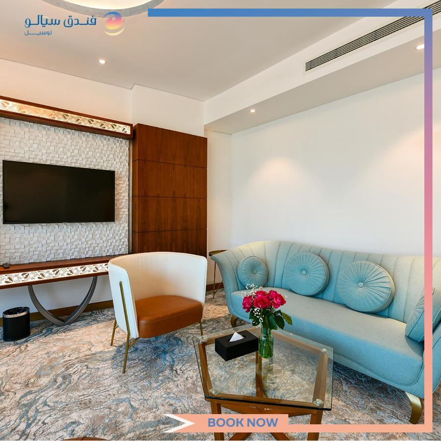 Cielo Hotel Lusail Qatar Exterior photo A living room in a suite at the hotel