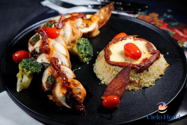 Cielo Hotel Lusail Qatar Exterior photo Octopus with couscous