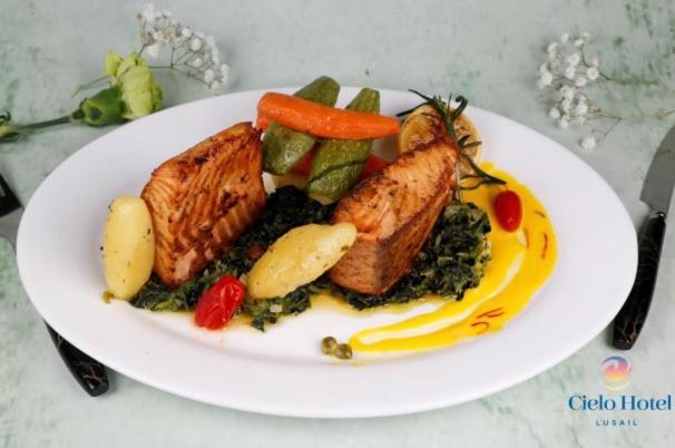 Cielo Hotel Lusail Qatar Exterior photo A plate of food